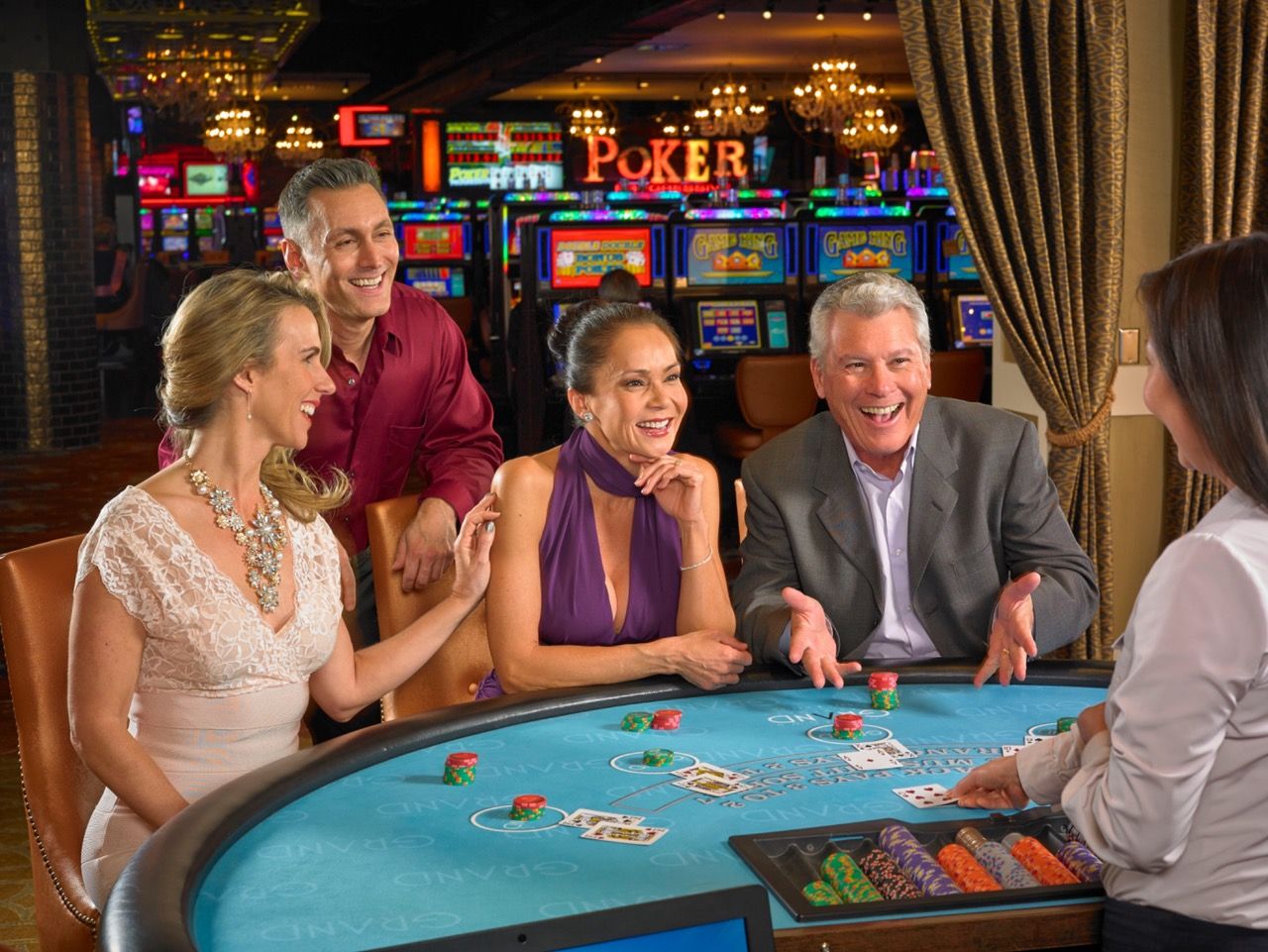 Guests enjoying a table game at a casino