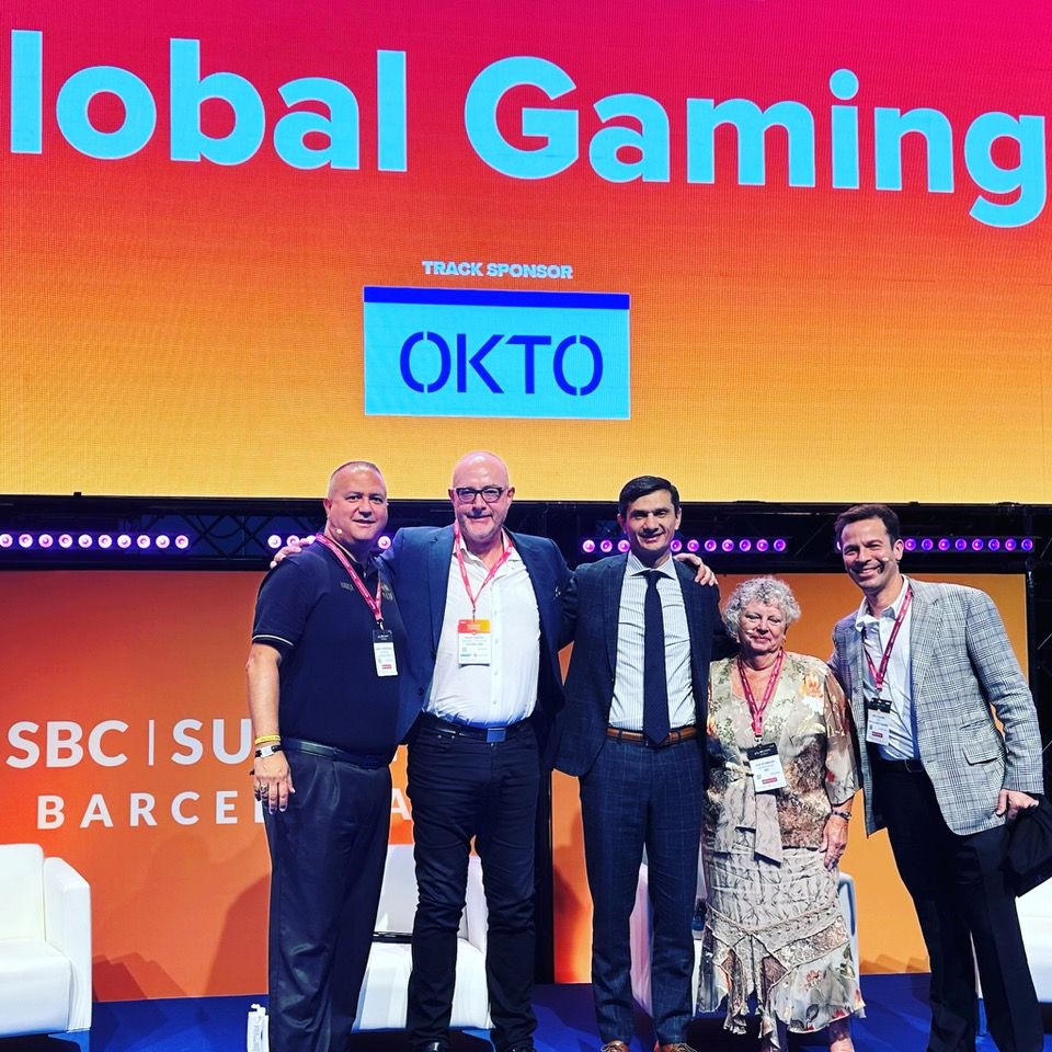 Gaming industry colleagues gathered at an event